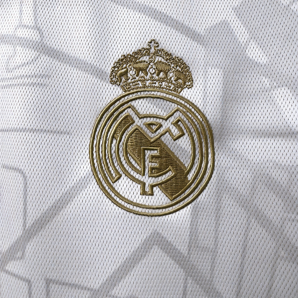 Real Madrid Jersey – White & Gold Edition ⚪✨